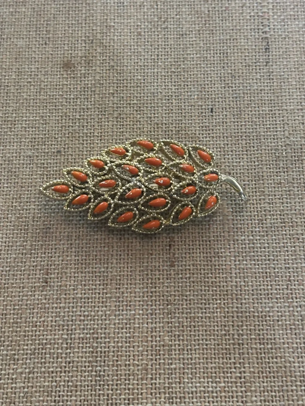 Gerry’s orange enamel leaf brooch